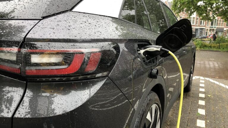 Electric car charging in the rain